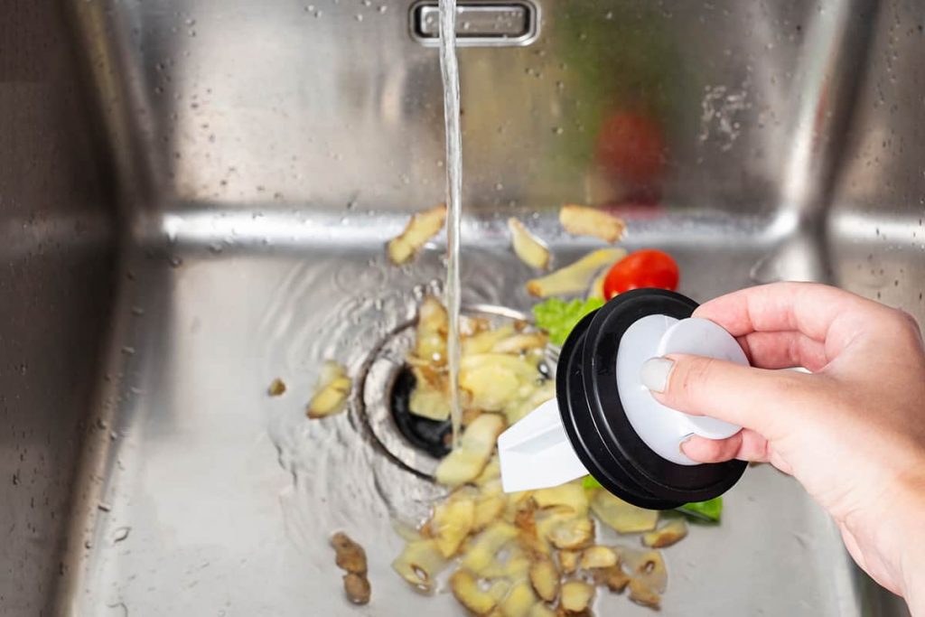 How Long Should You Run the Garbage Disposal? HowdyKitchen