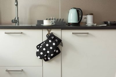 Where to hang oven mitts and pot holders