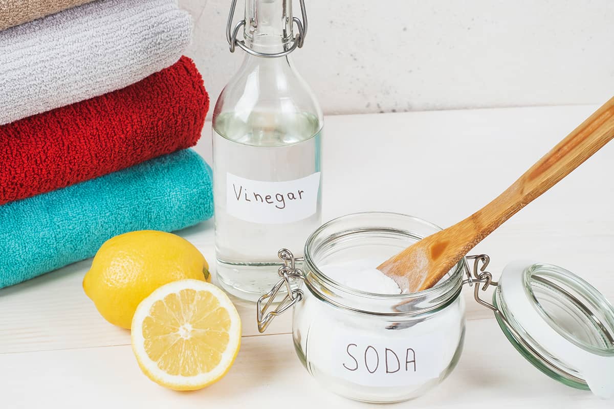 Scrub with vinegar and baking soda