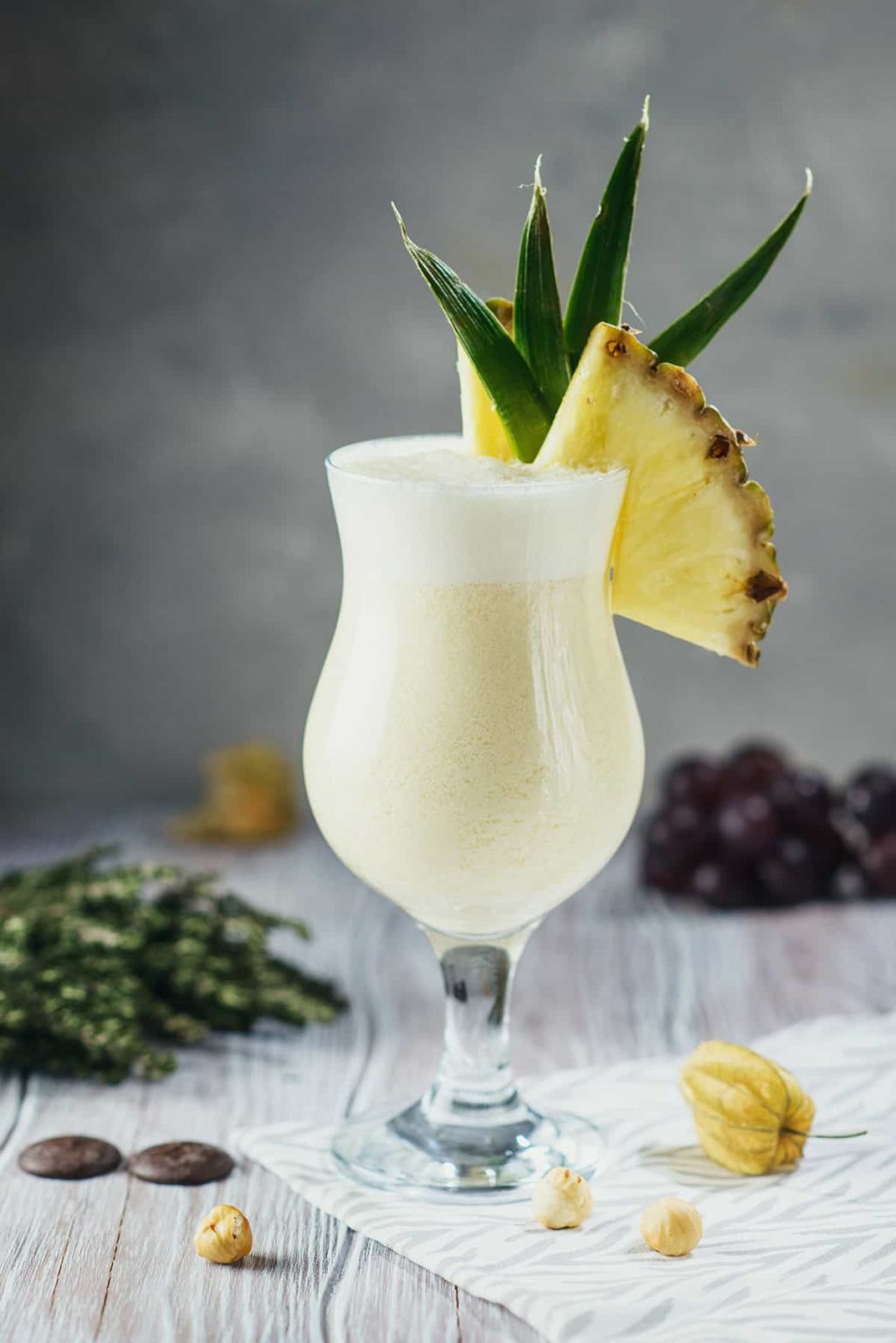 Pina Colada - The Ultimate Tropical Cocktail Guide - HowdyKitchen